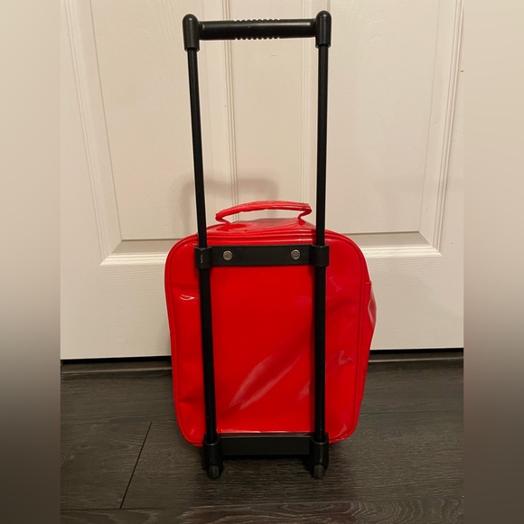 Hello Kitty 12” tall suitcase with wheels. - Picture 5 of 12